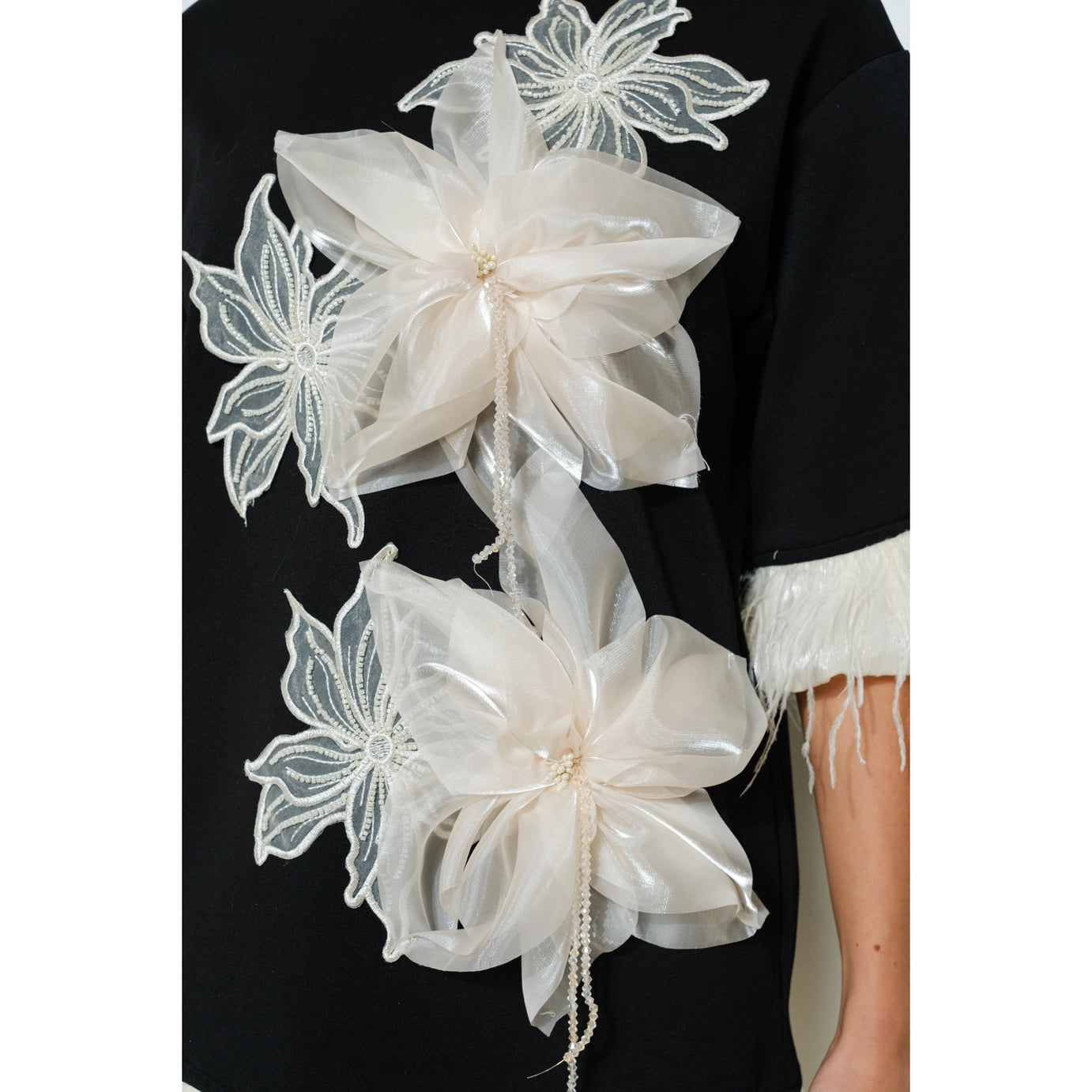 Close up of the Ivory Floral Appliqué