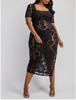 Plus sized woman wearing a black sheath dress with sheer cut outs.  