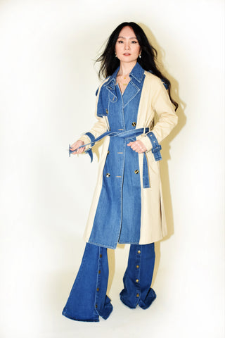 Woman wearing The Brixton Trench Coat, a color-blocked trench with denim and khaki panels and a denim belt.