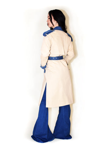 Woman wearing The Brixton Trench Coat, a color-blocked trench with denim and khaki panels and a denim belt.